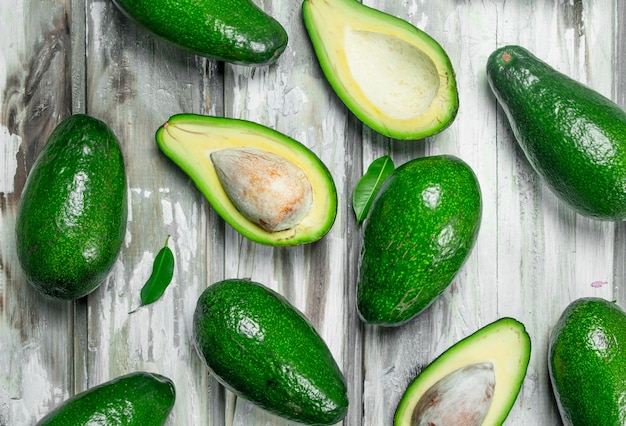 Juicy avocado with leaves