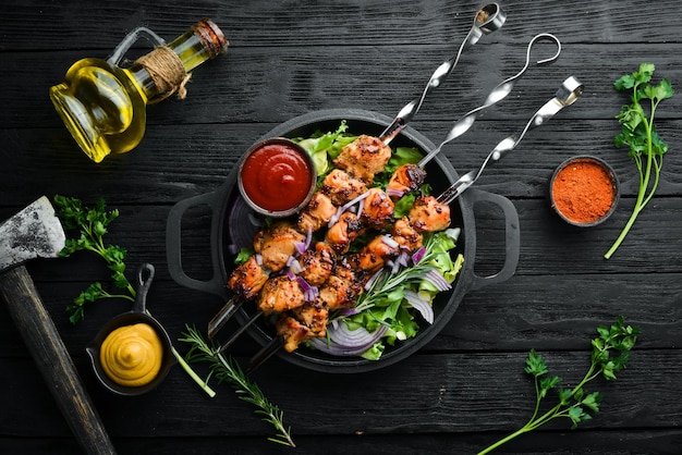 Juicy chicken skewers with rosemary and spices Top view Barbecue