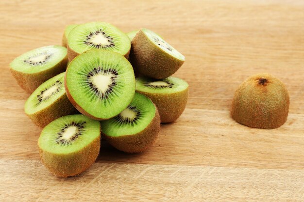 Juicy kiwi on wooden table