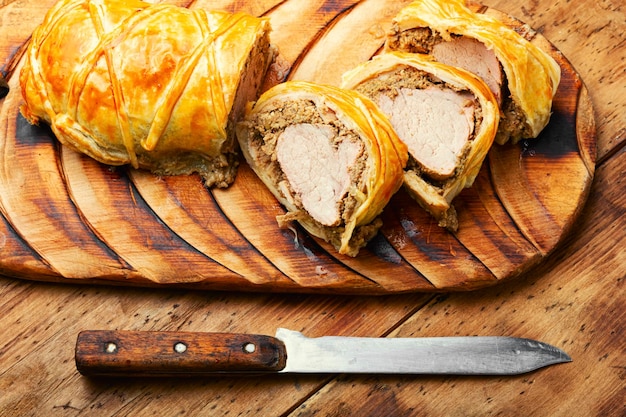 Juicy meat in a dough with spices mushroom or vegetable pate Wellington meat