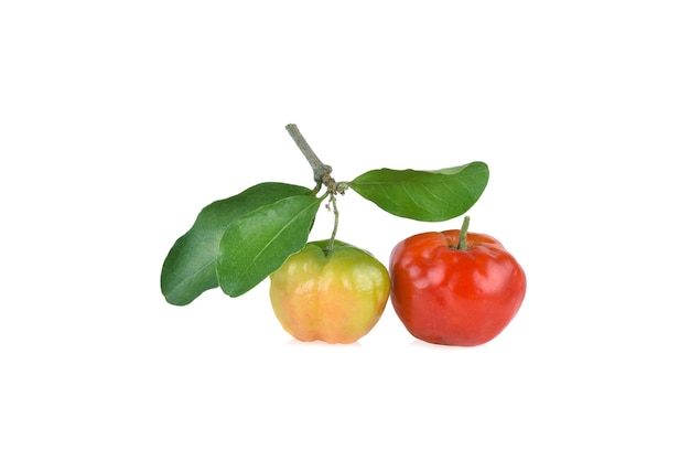 Juicy red Acerola cherry with green leaf isolated on white background.