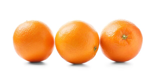 Juicy ripe oranges on white background