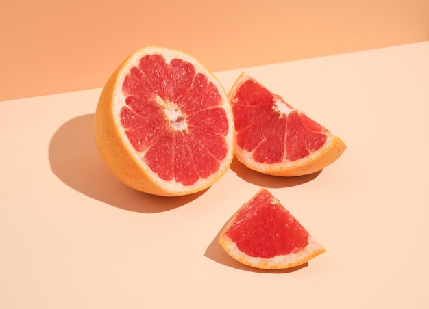 Juicy ripe sliced grapefruit Idea summer mood exotic vacation and proper nutrition