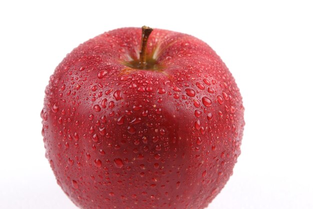 Juicy sweet whole red apple isolated on white background Healthy food concept Closeup of a red fruit