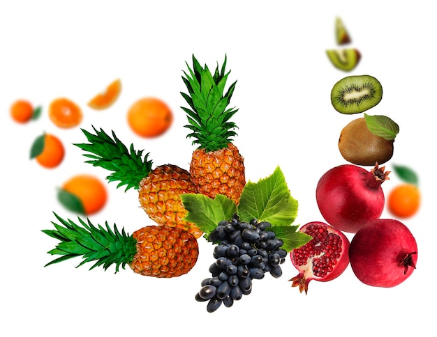 Juicy tasty fresh kiwi grape pomegranate orange pineapple levitate on a white background healthy diet Fresh fruits and vegetables