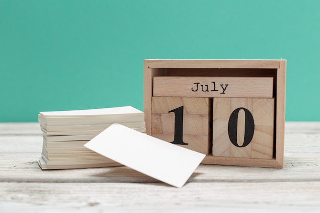 July 10th. Image of july 10, calendar on wooden. Summer time