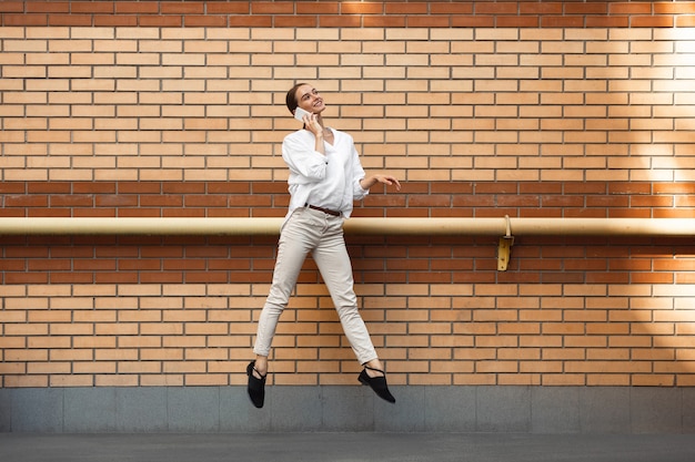 Jumping woman in the city