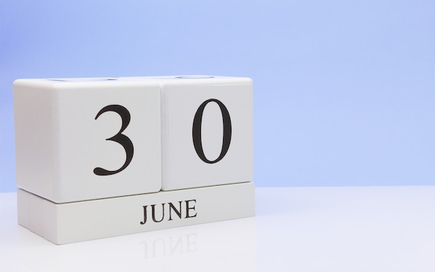 June 30st. Day 30 of month, daily calendar on white table