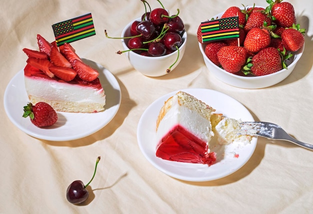 Juneteenth day picnic background with cherries and strawberries strawberry cheesecake