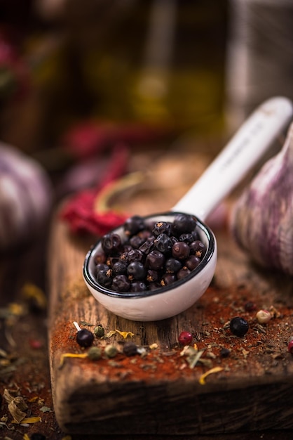 Juniper berry seeds on spoon