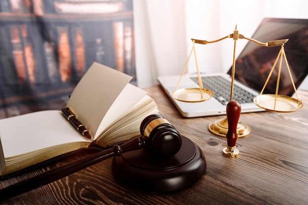 Justice and law conceptMale judge in a courtroom on wooden table and Counselor or Male lawyer working in office Legal law advice and justice concept