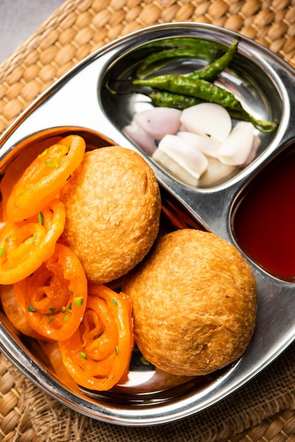 Kachori with Jalebi snack combination from India also called kachauri kachodi katchuri imarti