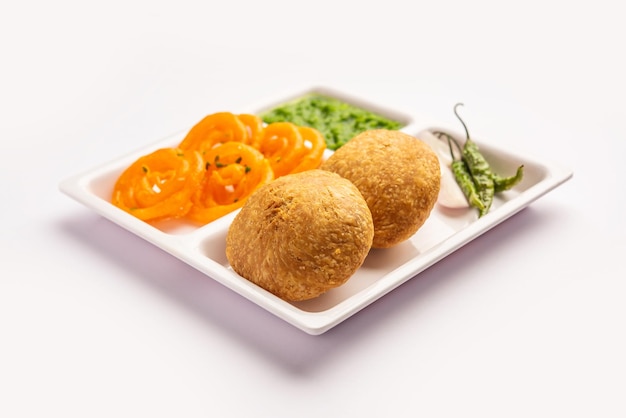 Kachori with Jalebi snack combination from India also called kachauri kachodi katchuri imarti