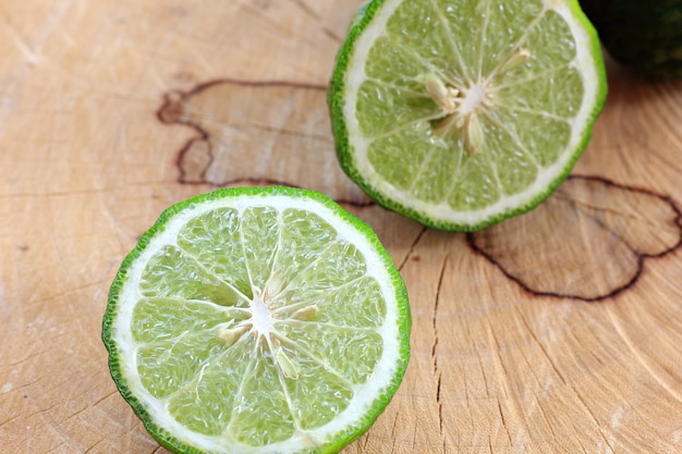 kaffir limes on  wood