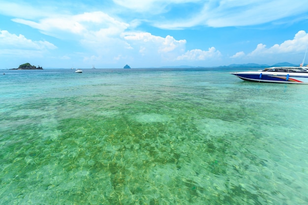 Kai island, Phuket, Thailand. Small tropical island with white sandy beach and blue transparent wate