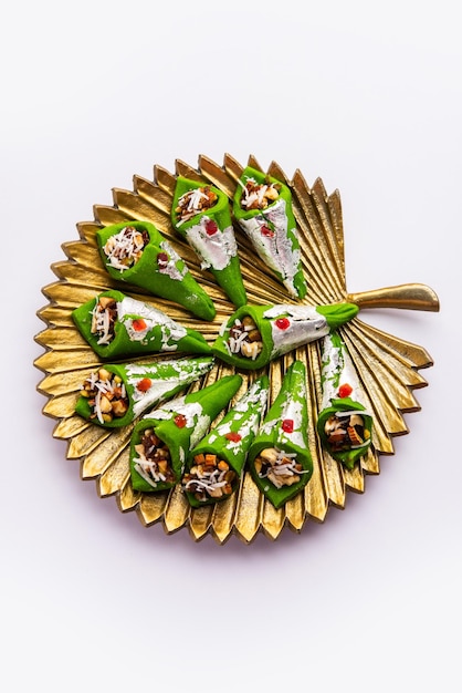 Kaju Gulkand Paan Mithai barfi Indian sweet or dessert served in a plate