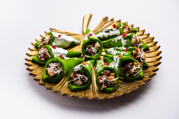 Kaju Gulkand Paan Mithai barfi Indian sweet or dessert served in a plate