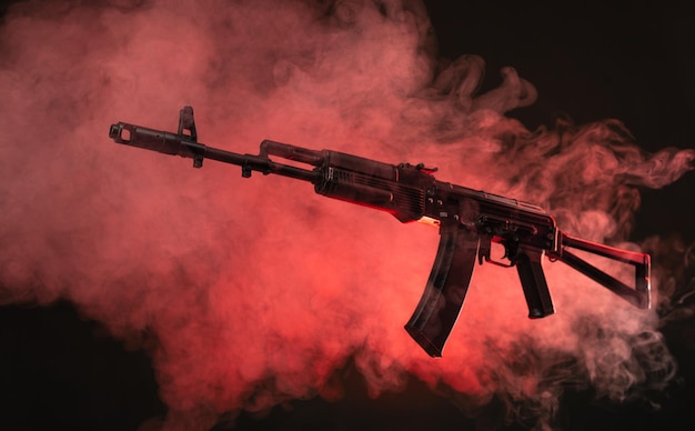 Kalashnikov assault rifle in smoke