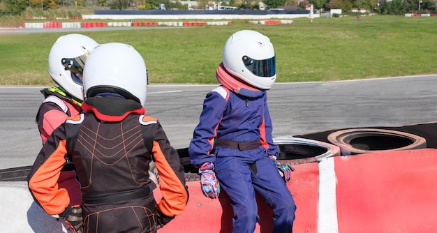 Karting pilots on the racetrack