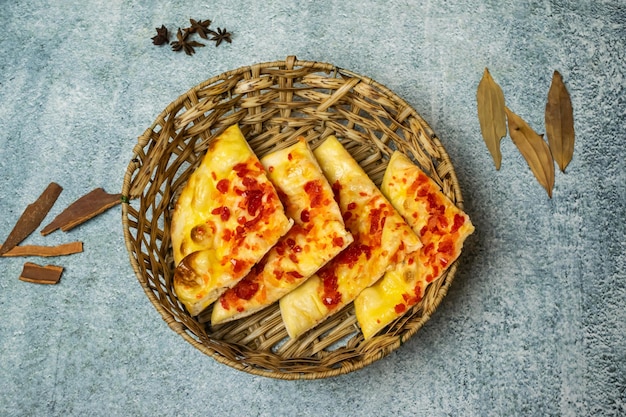 Kashmiri Naan served in a dish isolated on grey background top view of bangladesh food