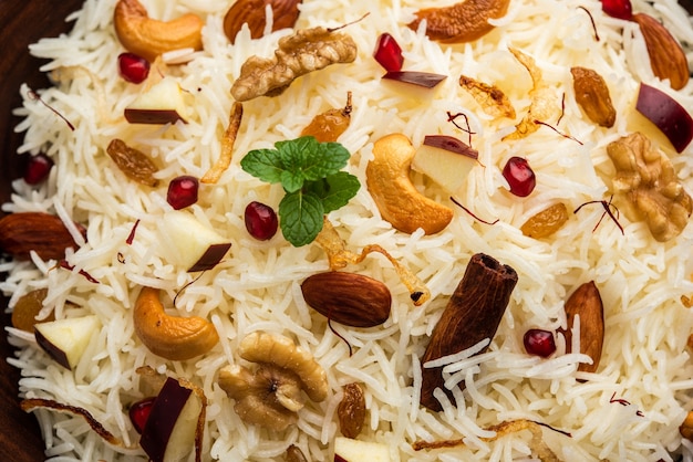 Kashmiri pulao made of Basmati rice cooked with spices and flavored with Saffron and dry fruits