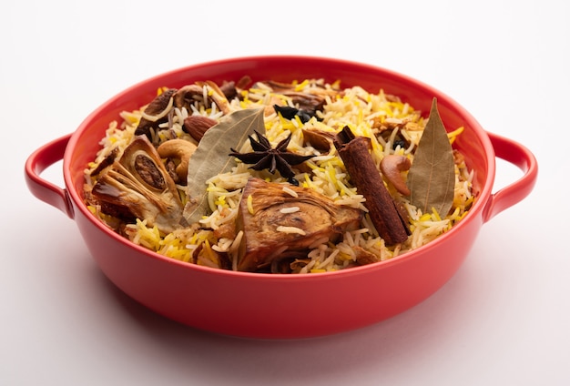 Kathal Biryani is made using raw jackfruit pieces cooked slowly with a variety of spices and mixed with basmati rice. served with curd and salan. Indian vegetarian food