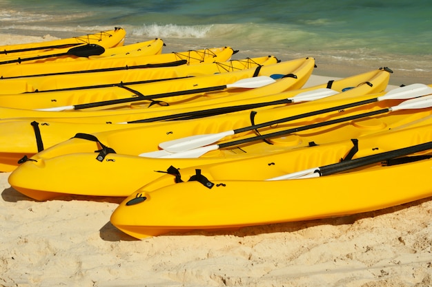 Kayaks on the beach sand