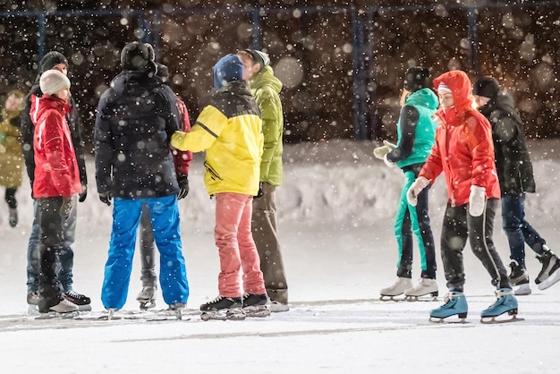 KAZAN RUSSIA 22 JANUARY 2017 Group of people on skating rink in the evening