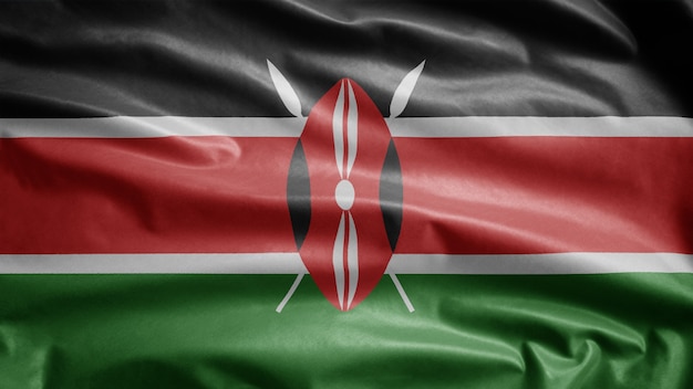 Photo kenyan flag waving in the wind. kenya banner blowing, soft and smooth silk.