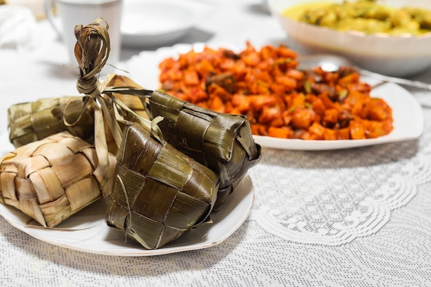 Ketupat served with various special  indonesian food. Indonesia Eid mubarak traditional menu.