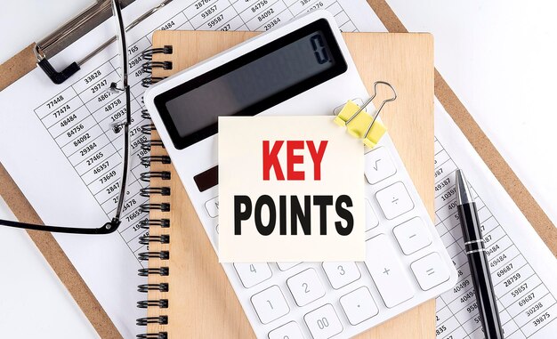 KEY POINTS word on sticky with clipboard and notebook business concept