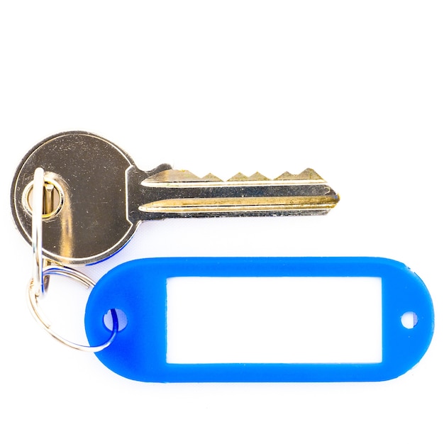 Key with a blank tag, isolate on white background. Add your text on the tag.