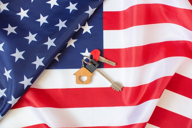 Keys to a new home and the Flag of America.Federal holiday in the United States.