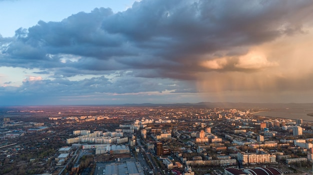 Khabarovsk city top view sunset beautiful clouds in the rain High quality photo