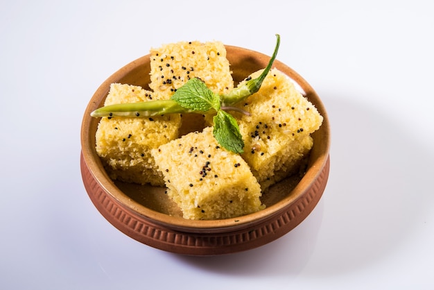 Khaman Dhokla is a veg snack or breakfast item from Indian state of Gujarat. served with fried green chilli