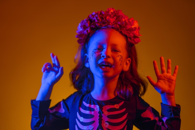 Kid at party in colorful lighting