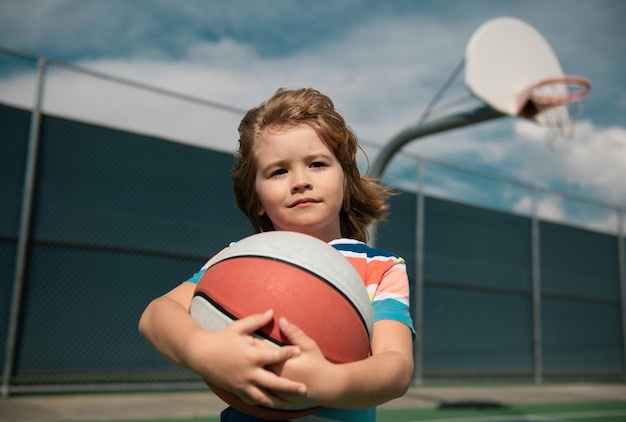 Kid playing basketball child boy preparing for basketball shooting active lifestyle basketball kids