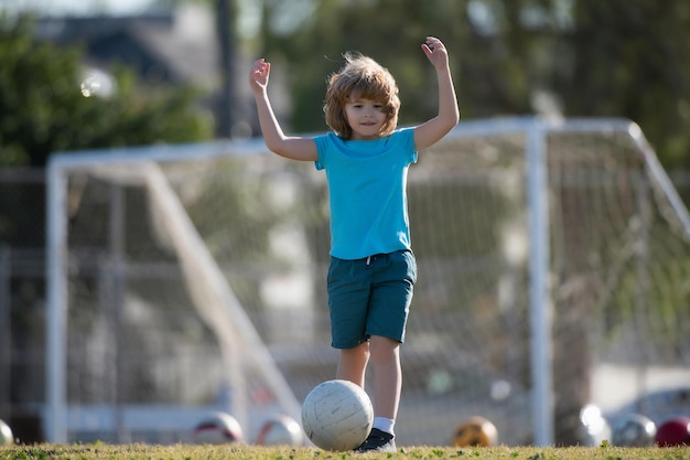 Kid playing soccer happy child enjoying sports football game kids activities little soccer player ac