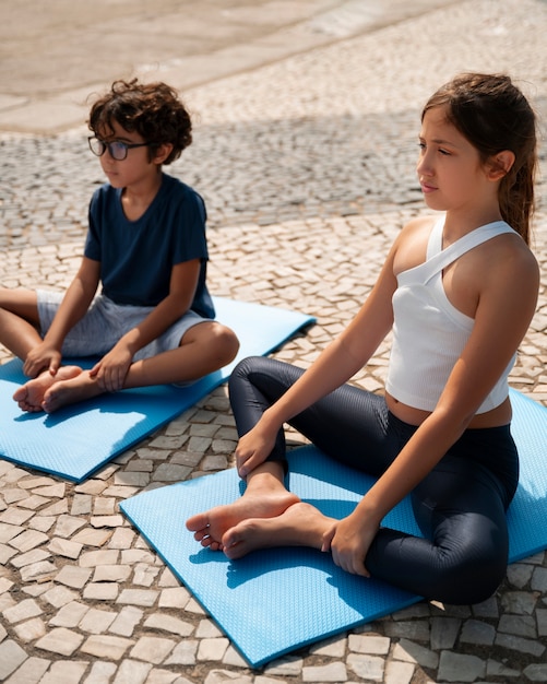 Kid practicing health outdoors