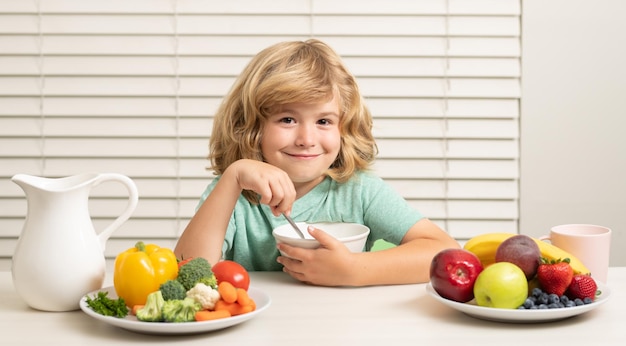 Kid preteen boy years old eating healthy food vegetables breakfast with milk fruits and vegetables m