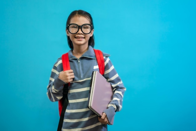 Kid student, Asian children close up of cute and cheerful people, wearing glasses and holding laptop