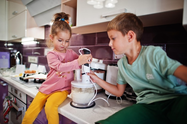 Kids cooking at kitchen happy children's moments