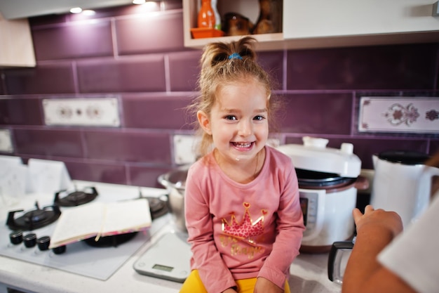 Kids cooking at kitchen happy children's moments