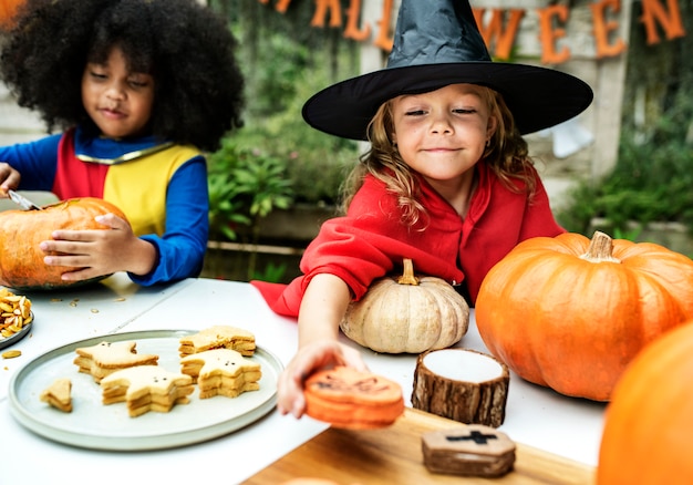 Kids in costume enjoying Halloween season