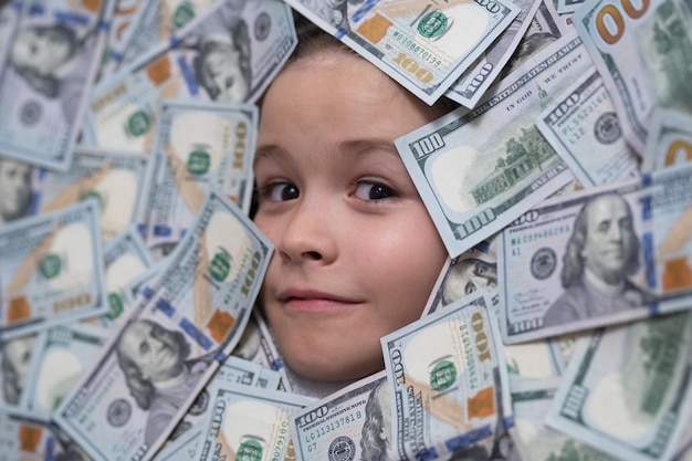 Kids how to be rich child with dollar bills near face money banknotes cash dollars bills financial i