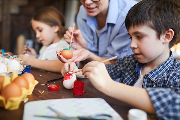 Kids Painting Easter Eggs