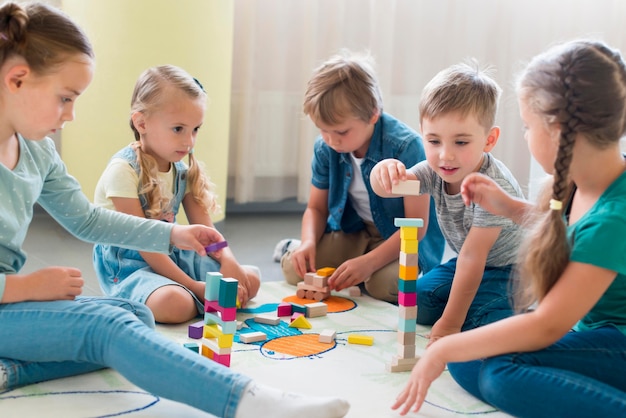 Kids playing together in kindergarten