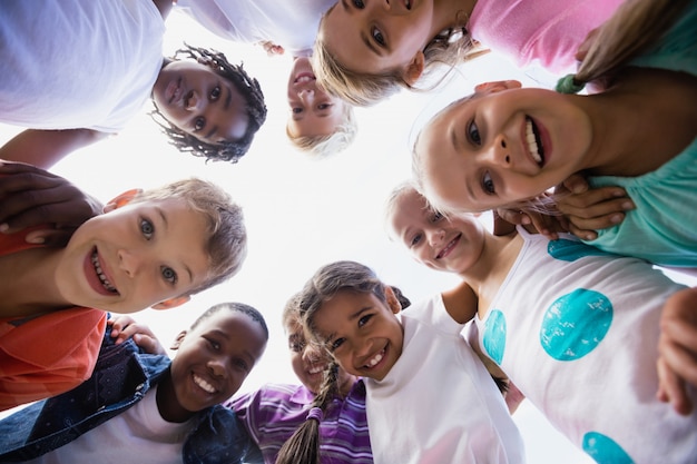 Kids posing together during a sunny day