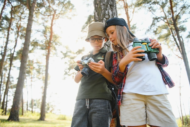 Kids scouts in the forest