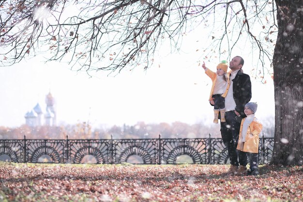 Kids walk in the park with first snow